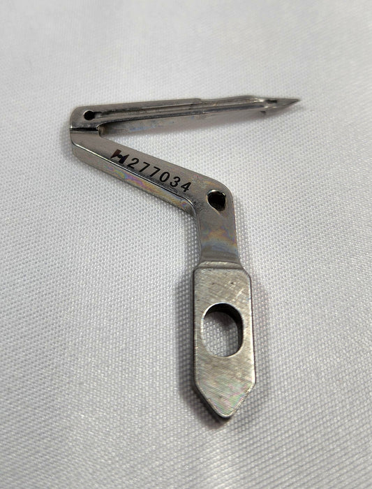 277034